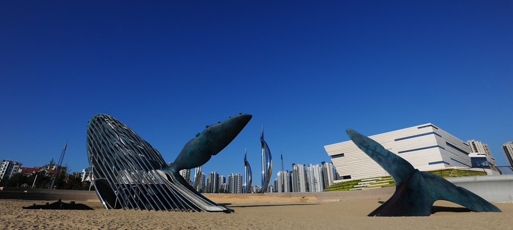 Bronze Whale Sculpture in Beach