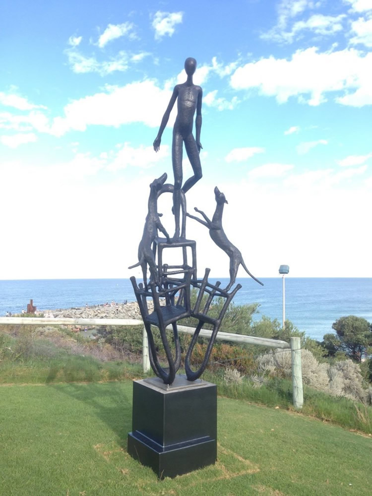 bronze suclpture is in beautiful Cottesloe Beach for exhibition