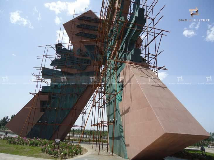 site installation work of large metal outside monumental sculpture