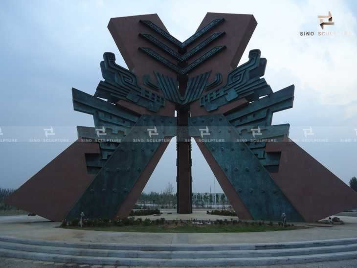 large metal outside monumental sculpture site installing