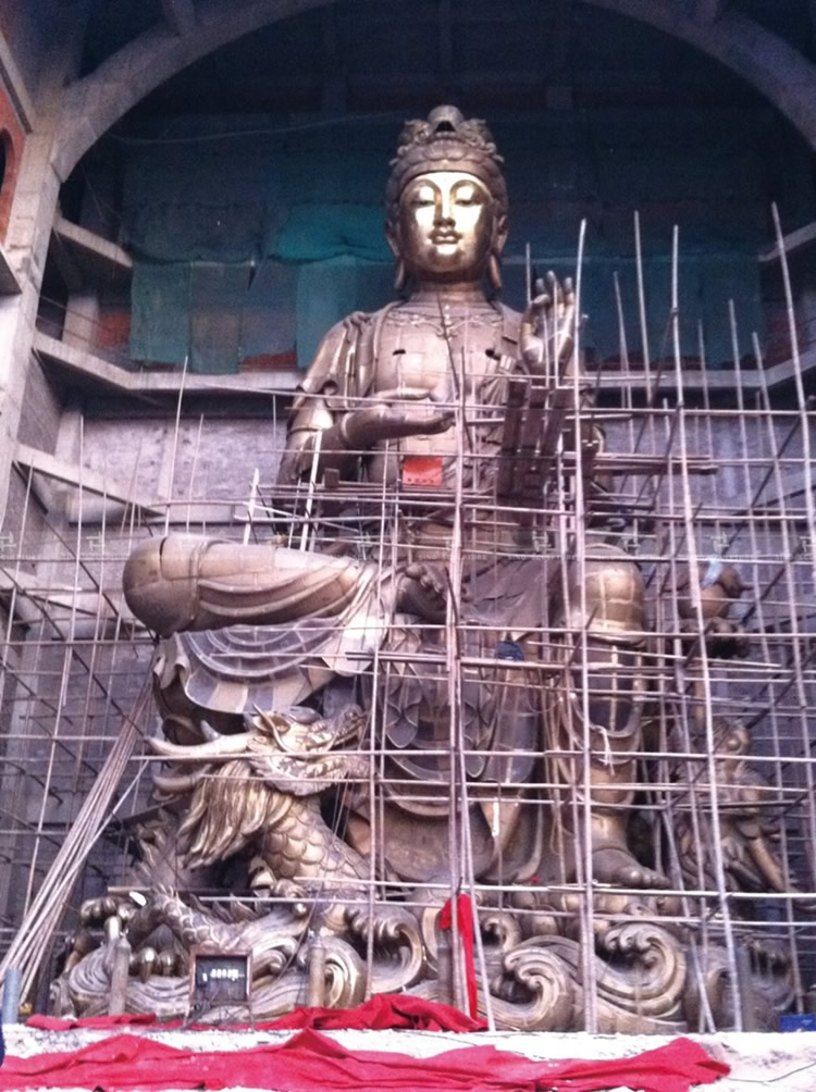 site installation of the hand-forged bronze Buddha sculpture