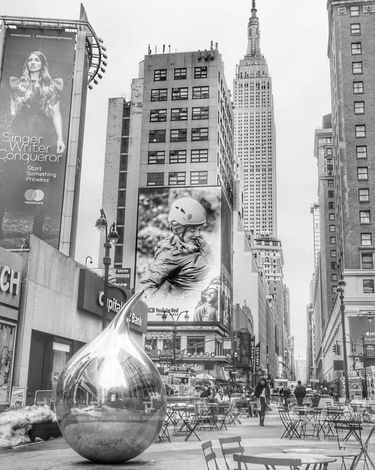 mirror stainless steel statue, time square NYC  New york