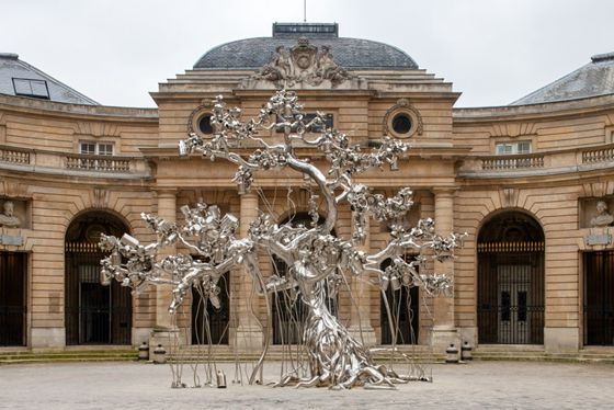 Stainless steel  People tree sculpture by Subodh Gupta  India 