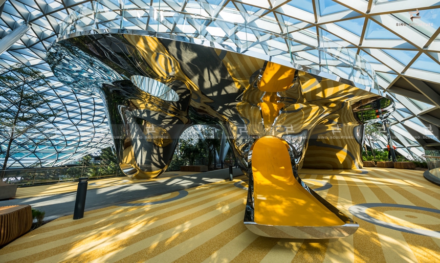 double curved stainless steel facade Discovery Slides at Jewel Changi Airport