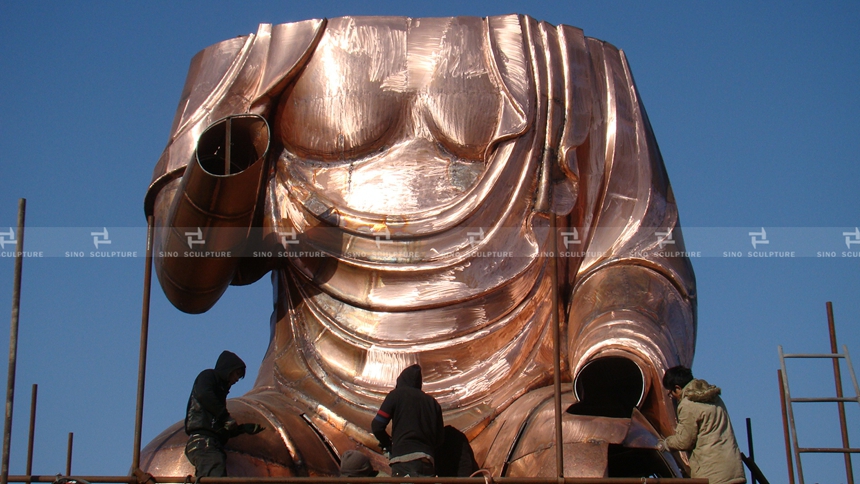 welding of the large bronze buddha sculpture