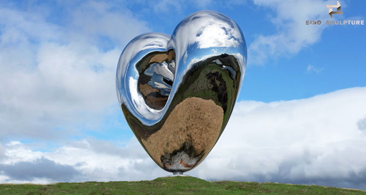 completed mirror stainless steel sculpture Love me