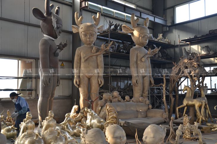 large bronze statue in factory 