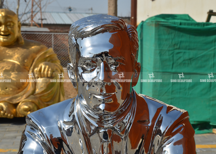 Mirrored stainless steel casted figure artwork