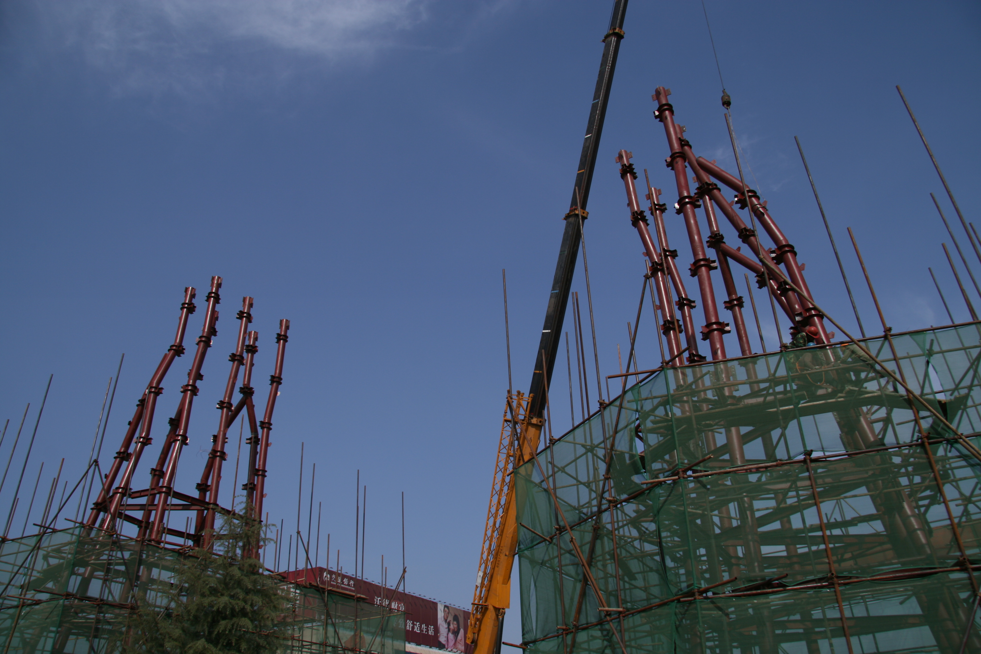 internal steel structure assembling and installation of the large hand bronze sculpture