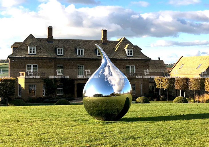 mirror polished stainless steel tear sculpture by Richard Hudson