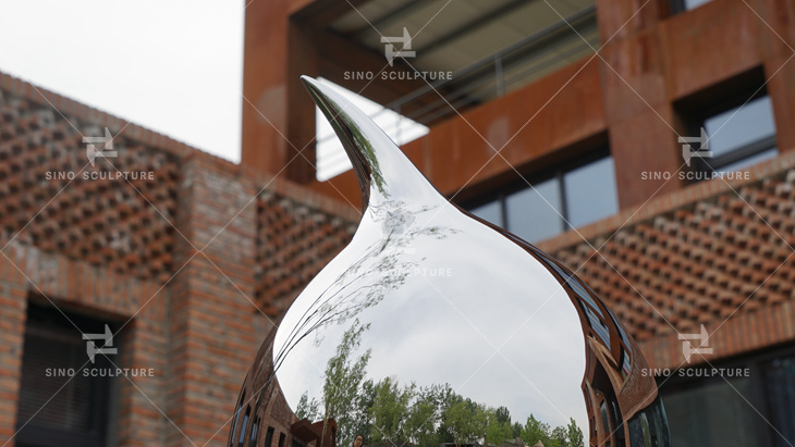 curved stainless steel statue details