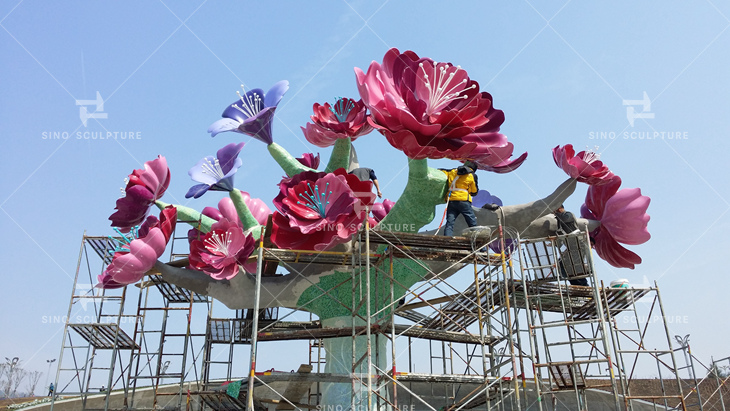 site installation of stainless steel tree sculpture