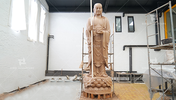 1:1 scale clay modeling of the large bronze Buddha statue in Sino�s factory