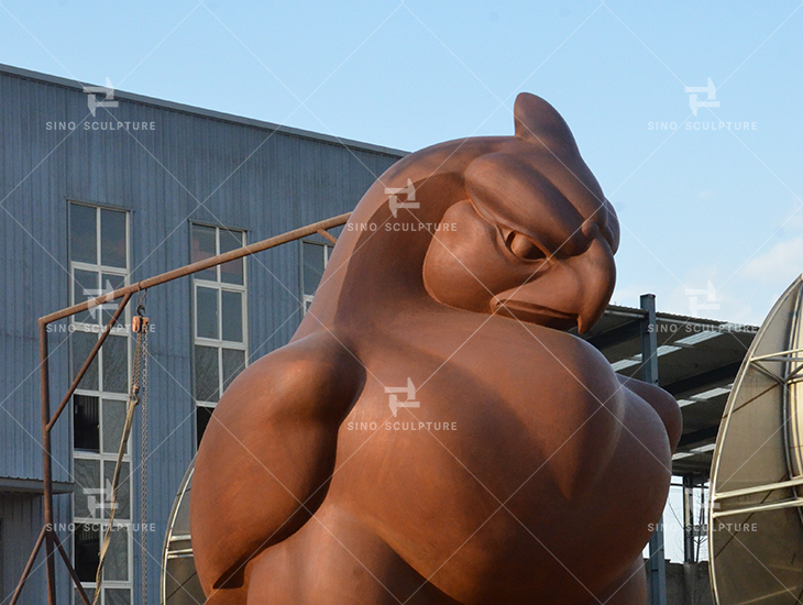 The rust finish of the Corten steel Bird sculpture