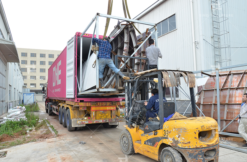 Container loading of the hand forging bronze Buddha statue in Wat Paknam Bhasicharoen, Bangkok, Thailand