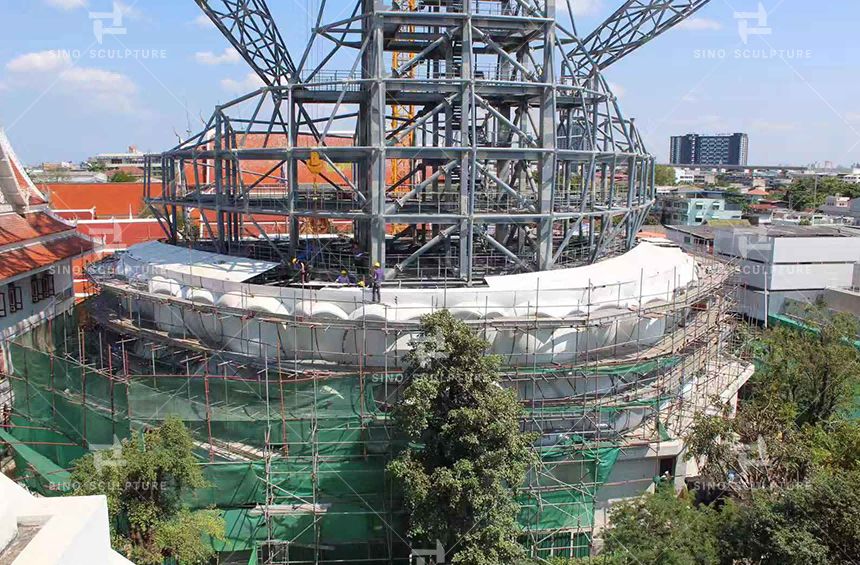 Site installation of the large customized bronze Buddha statue in Wat Paknam Bhasicharoen, Bangkok, Thailand