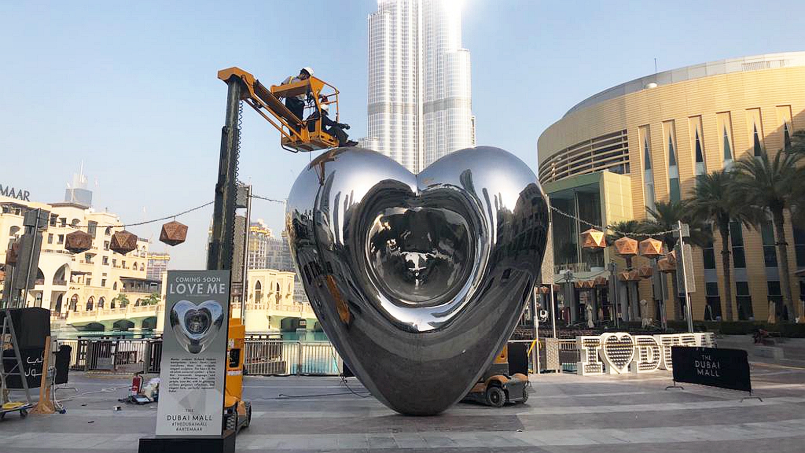Love me sculpture , stainless steel , Dubai Mall  by EMAAR , RICHARD HUDSON