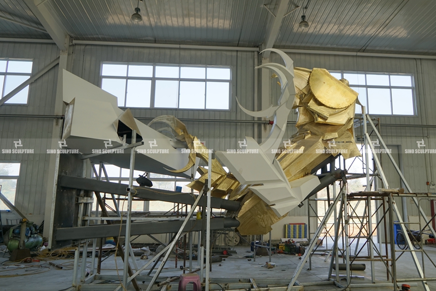 Spray-Painted-Brass-Falcon-Sculpture-Pre-installation