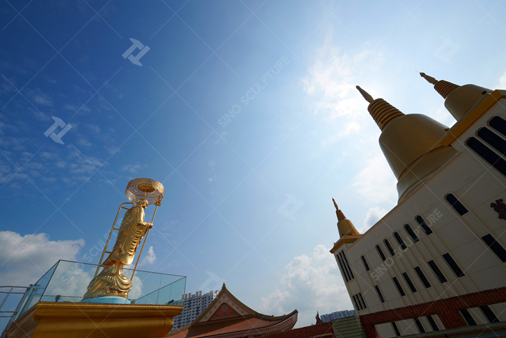 golden bronze buddha sculpture installed in Singapore