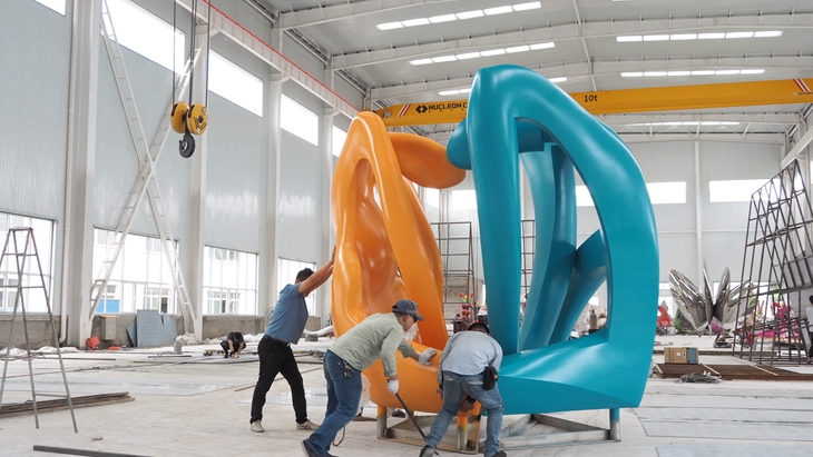 Trial assembly of the Family Sculpture in Sino Sculpture�s Foundry