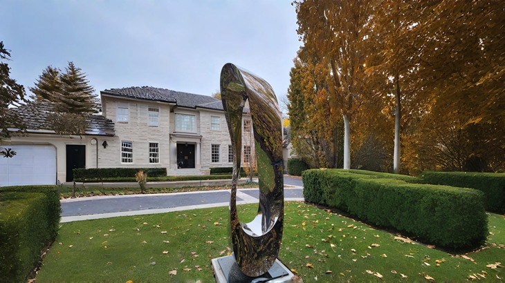 The final installation of the mirroring steel Mobius Sculpture