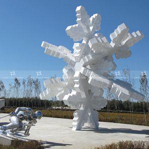 Perforated stainless steel sculpture with white painted