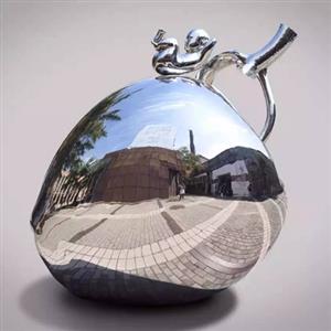 Mirror polished stainless steel apple sculpture